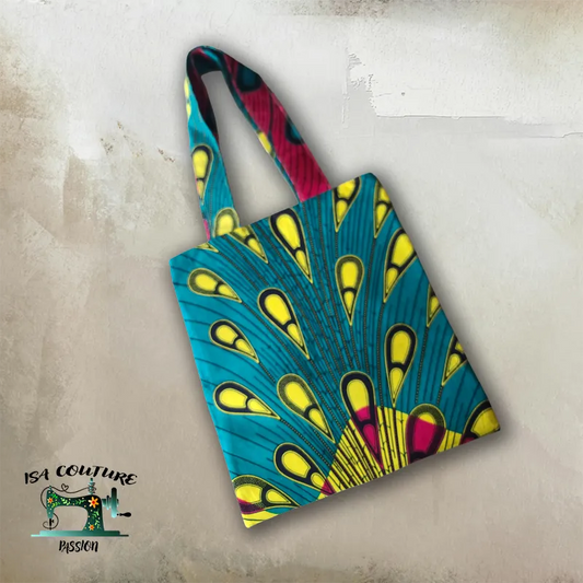 Sac fourre tout plume de paon en coton wax